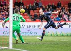 Ross County striker Liam Boyce scoring in the final day of last season, in a stunning 4-0 win at Aberdeen. He will aim to get off and running in their league opener against Dundee on Saturday.