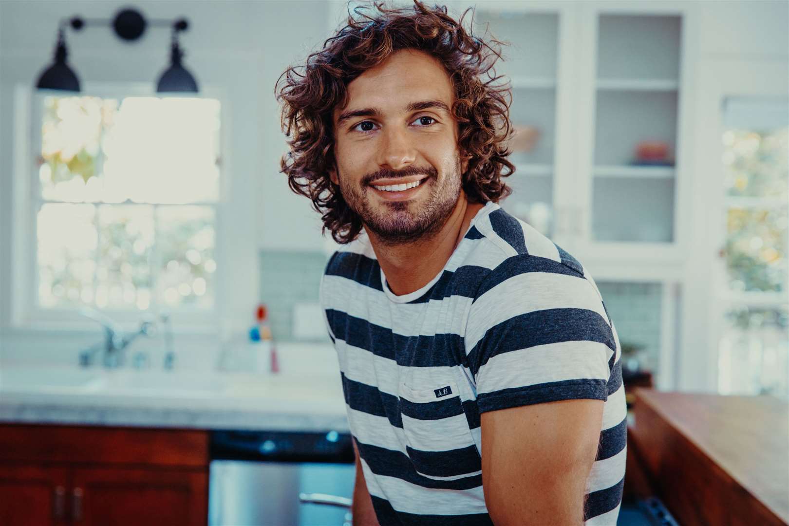 Joe Wicks is uploading daily PE lessons for children – and grown-ups – to follow at home.