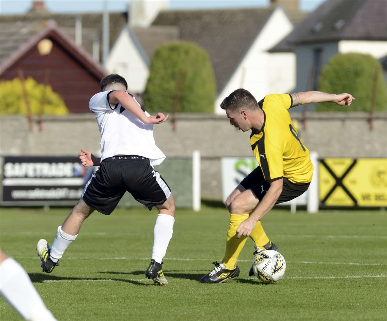Glenn Main (right) in action for Nairn against Clach in January last year before lockdown wrecked his 18th season. Picture: James Mackenzie