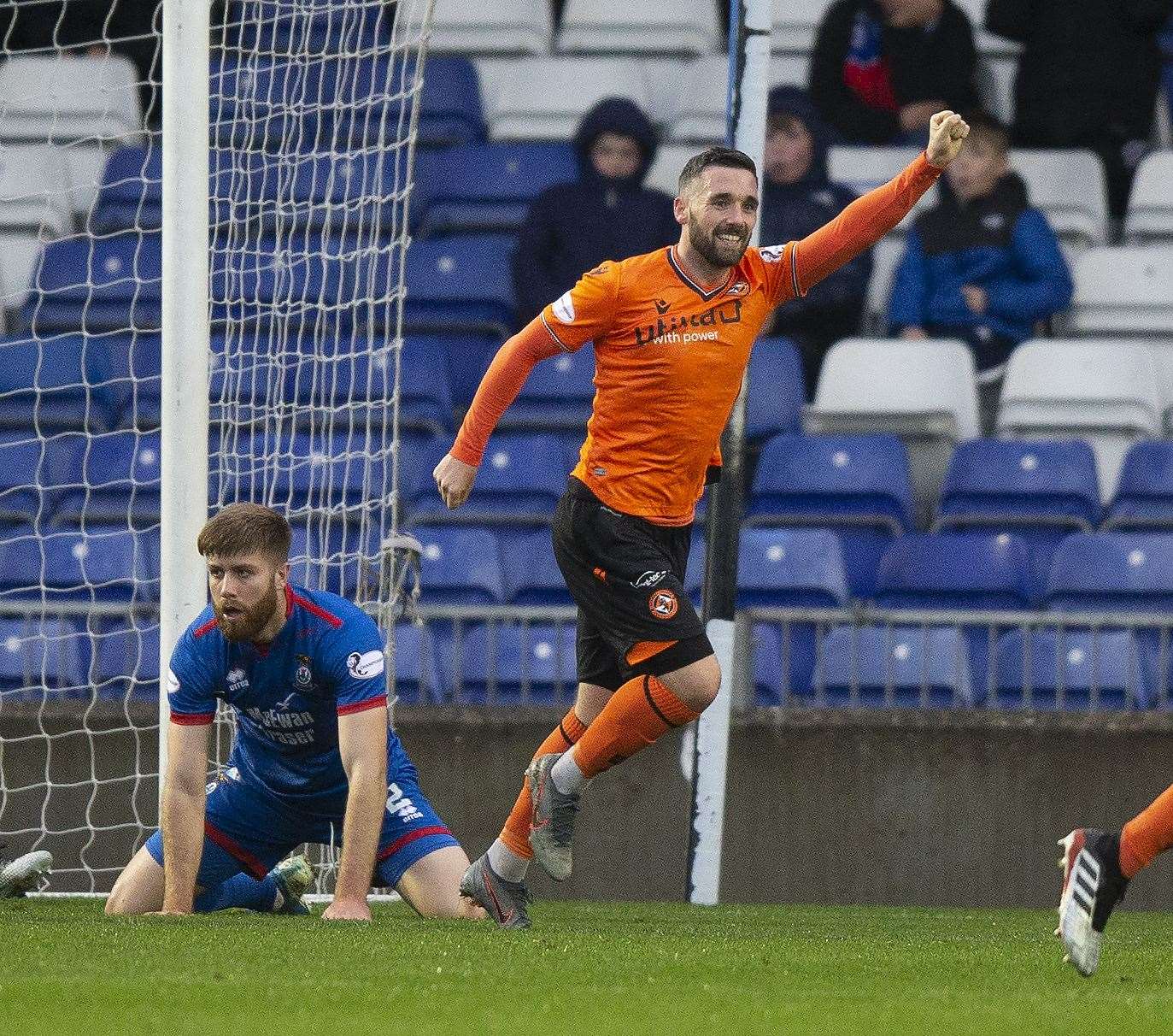 Dundee United Nicky Clark celebrates after an own goal by Inverness Caledonian Thistle's Shaun Rooney.