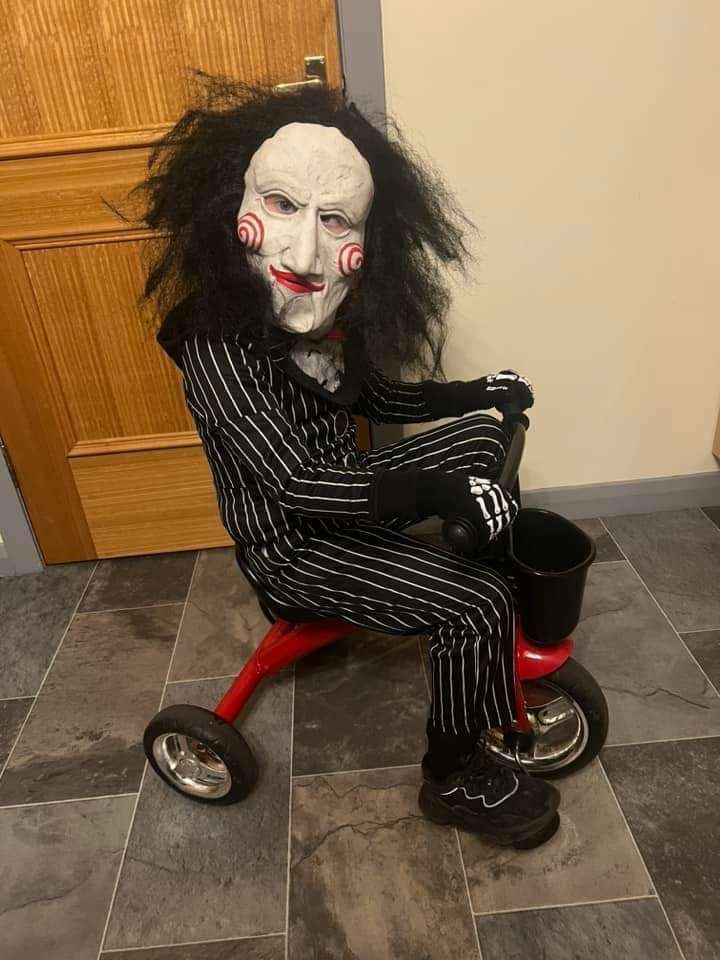 Layton Bell dressed as Billy Puppet from Jigsaw