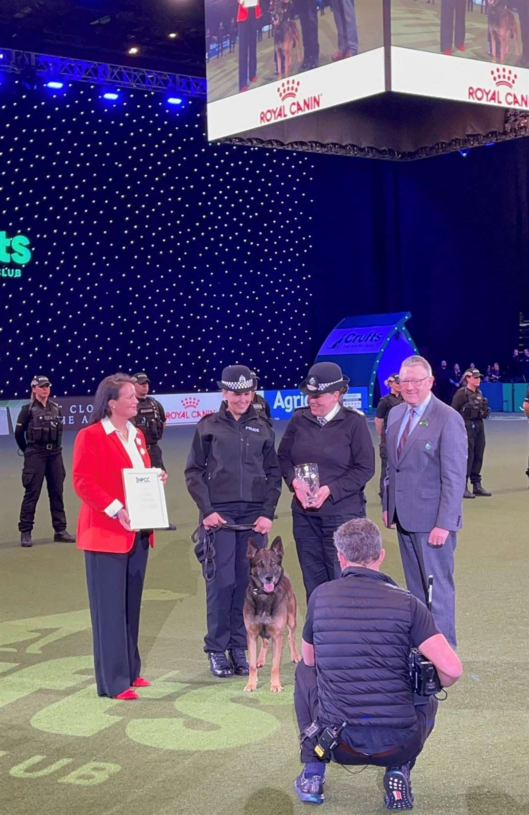Pc Carly Fulton and Ben receive their award from Chief Constable Pippa Mills at Crufts (Police Scotland/PA)
