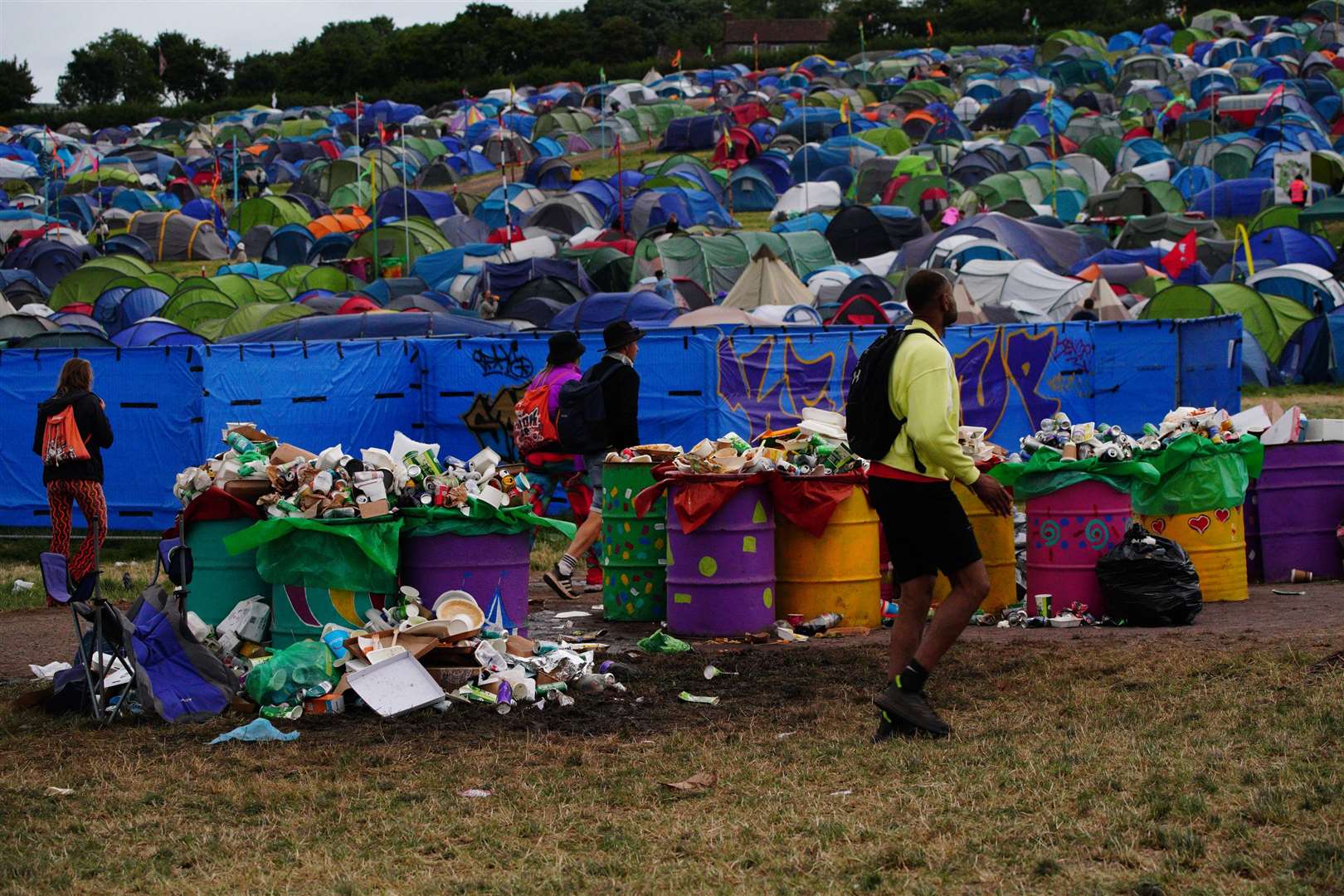 Waste left by festival goers waiting to be cleared at Worthy Farm in Somerset (Ben Birchall/PA)