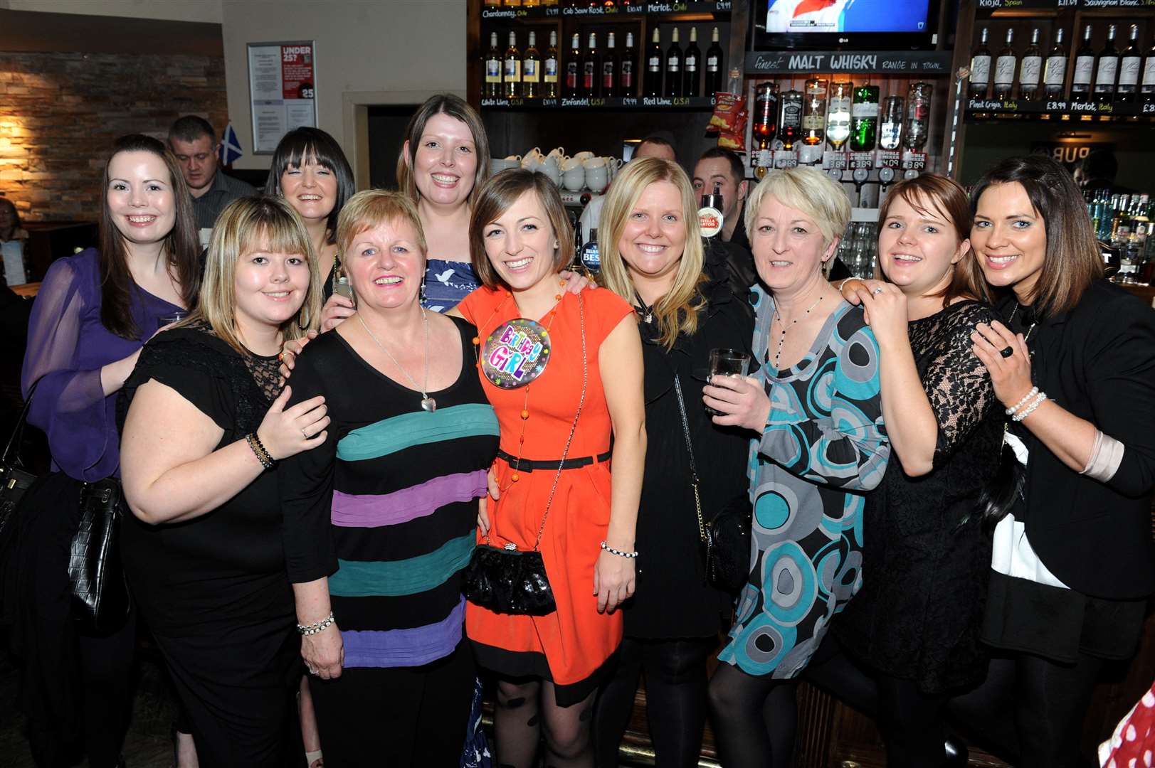 Lindsay Moodie (red,centre) from Scourgie celebrates a special birthday at The Exchange with friends and family.