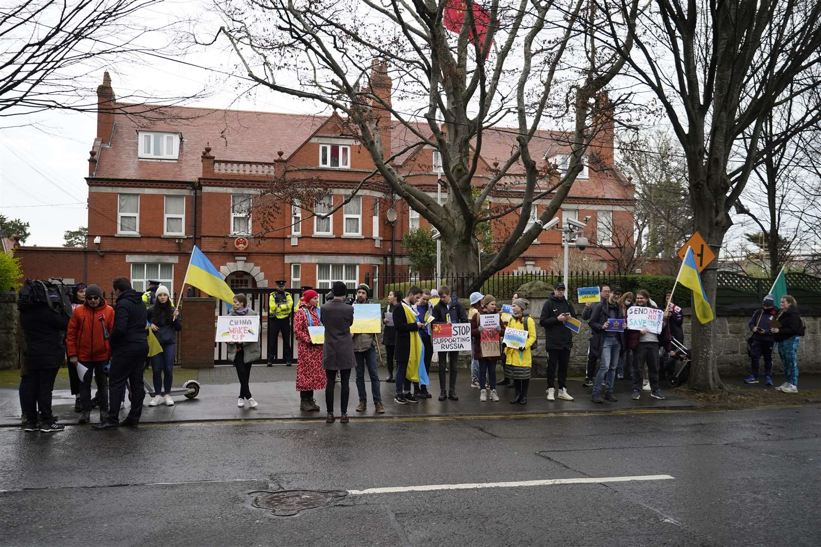 People protesting outside the Chinese Embassy in Dublin (Niall Carson/PA)