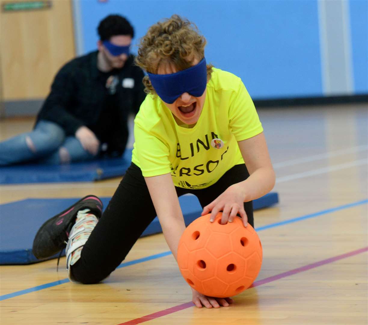 Taking part in a goalball event for the visually inpaired.