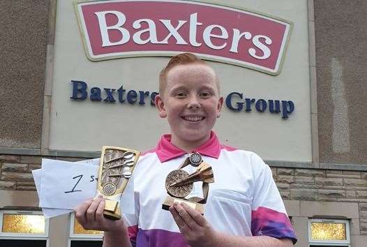 Baxter MacIntosh won three trophies at the Fochabers Darts Open.