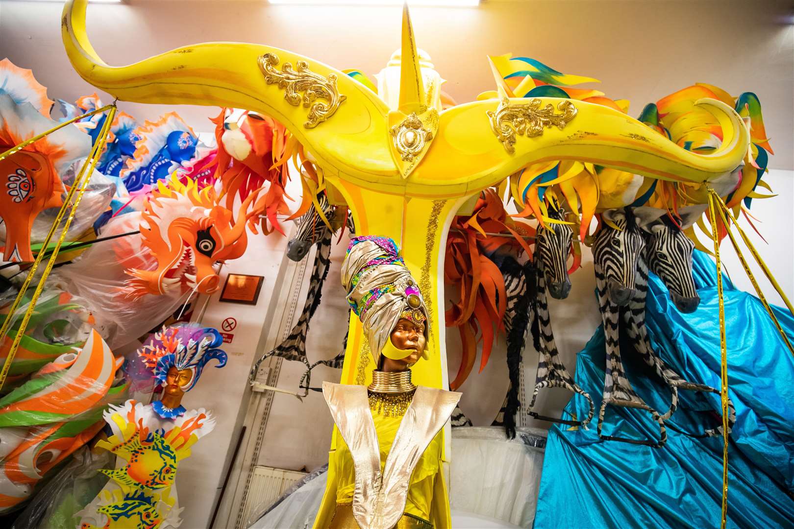 Costumes from previous Notting Hill Carnivals in a shop in Harlesden, north London (Aaron Chown/PA)