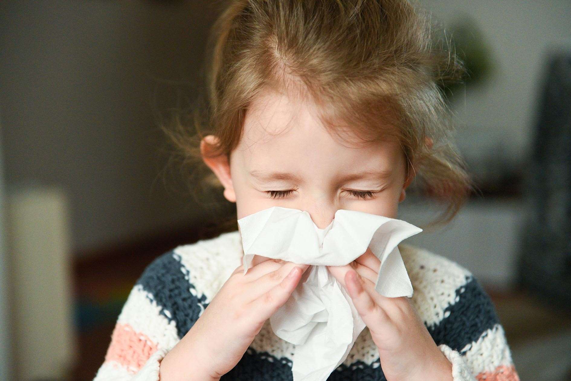 A child with a cold.