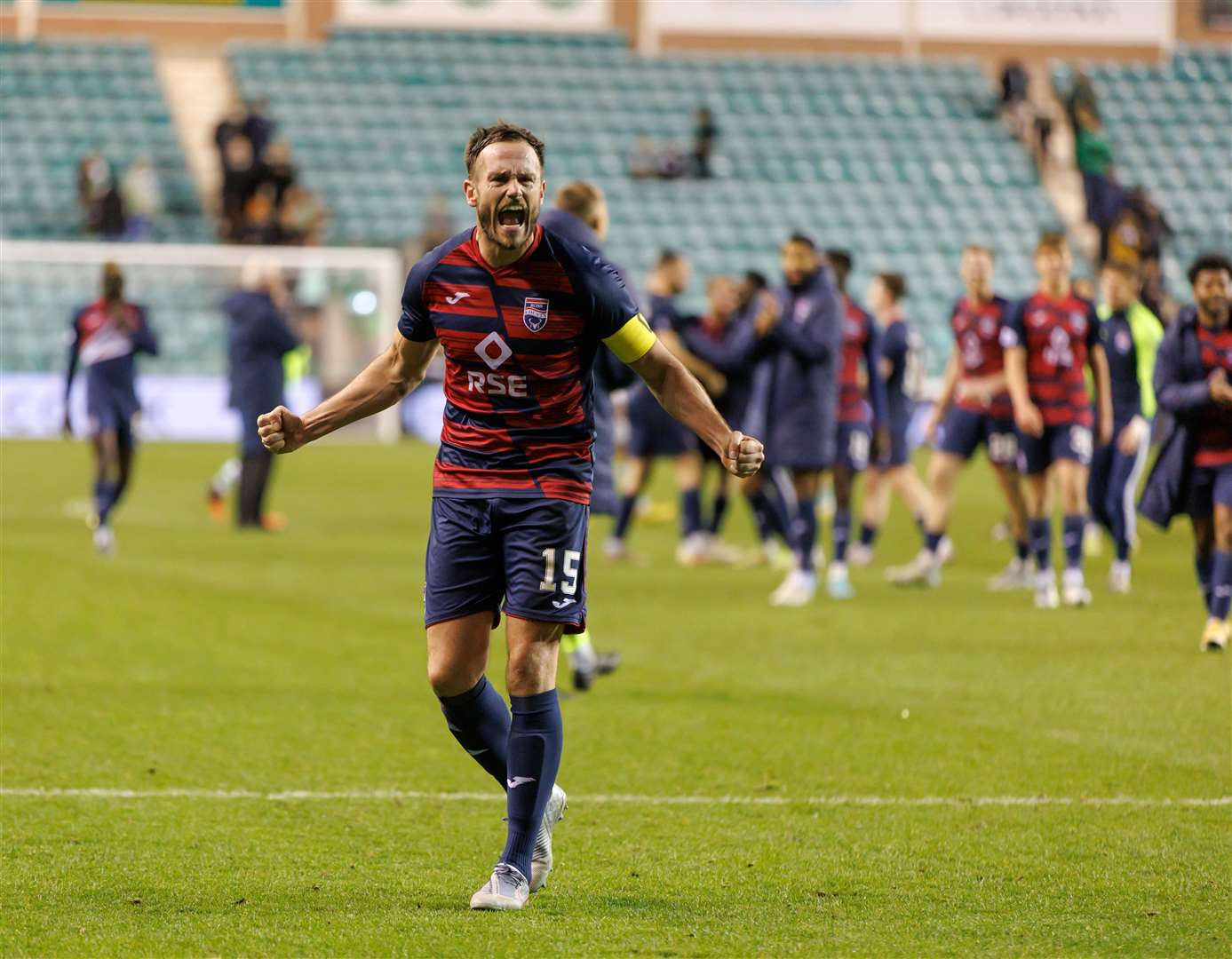 Keith Watson celebrates Ross County's win at Easter Road back in November.