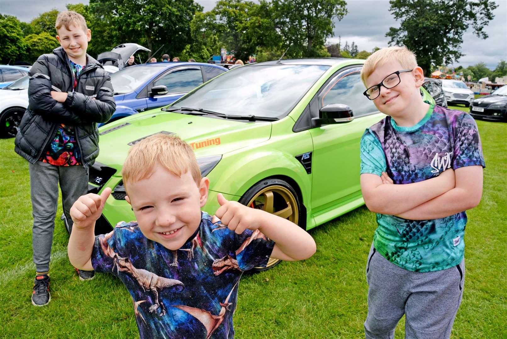Inverness brothers David (11), Ryan (4) and James McBain (8) enjoyed the car display. Picture: Gair Fraser.