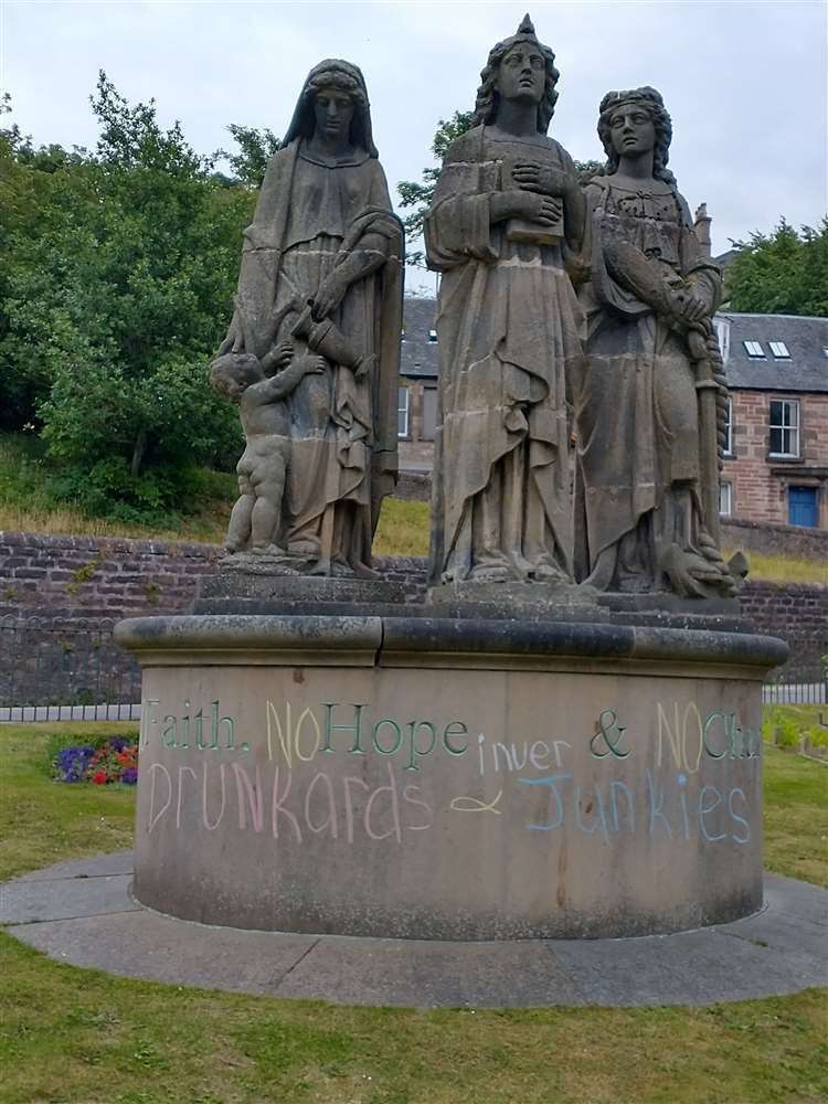 The Three Virtues with defaced pedestal.