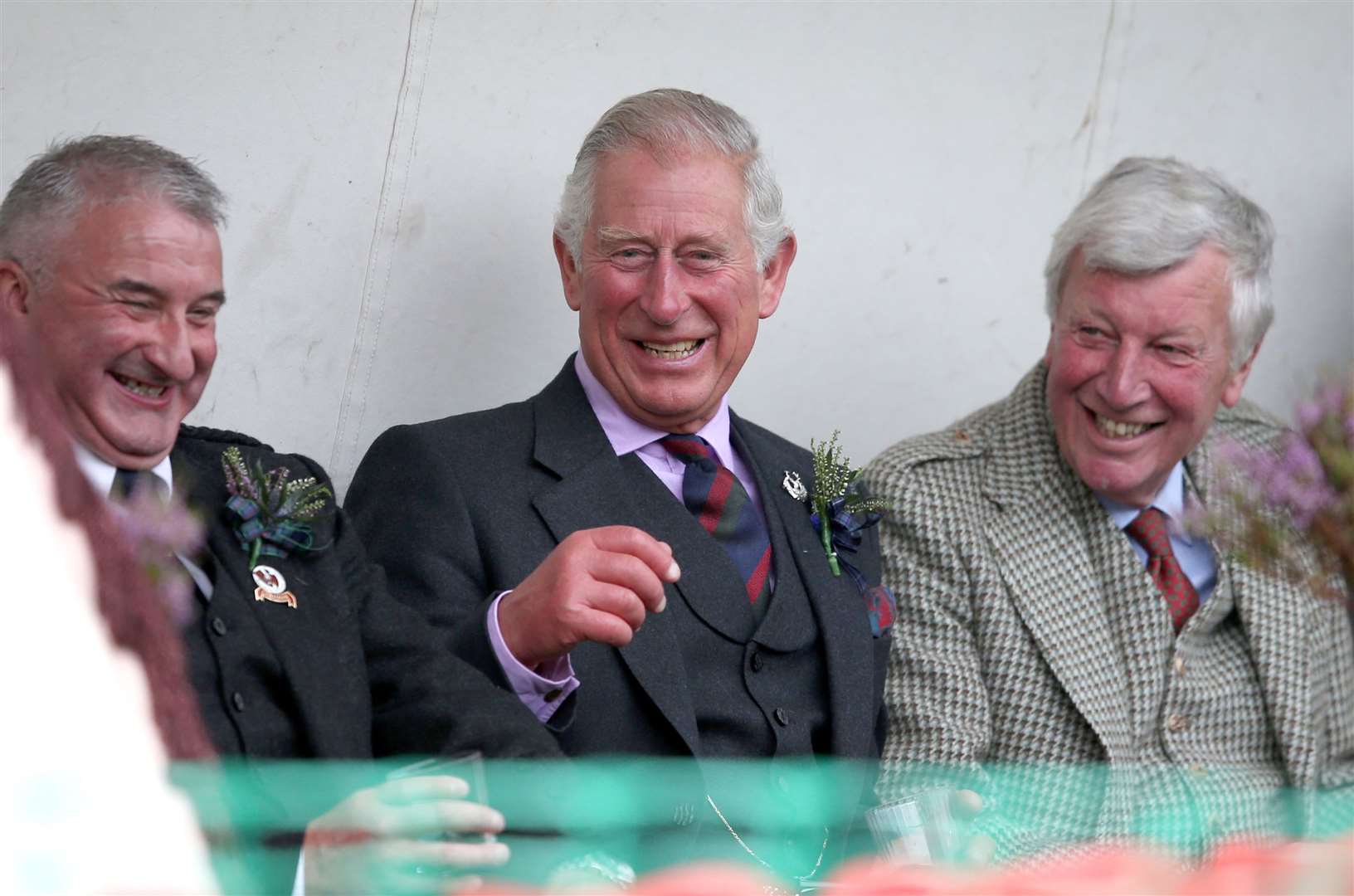 Charles with John Sinclair (left) and James Ingleby, Lord Lieutenant of Aberdeenshire (right), during the Highland Games in Ballater (Jane Barlow/PA)