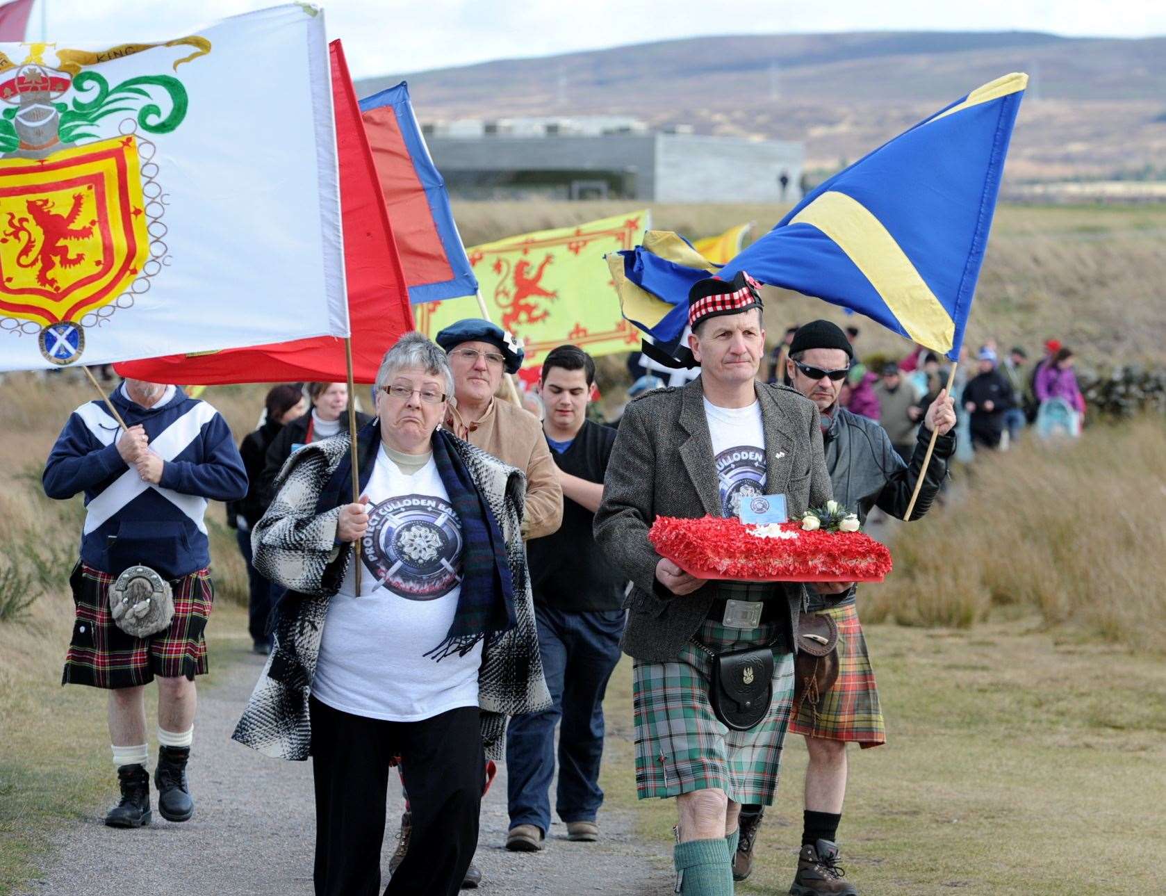 Protest march at Culloden Battlefield against the development by Inverness Properties , with organiser George Kempik carying a wreath for the Fallen . . Picture: Gary Anthony. Image No.024861.