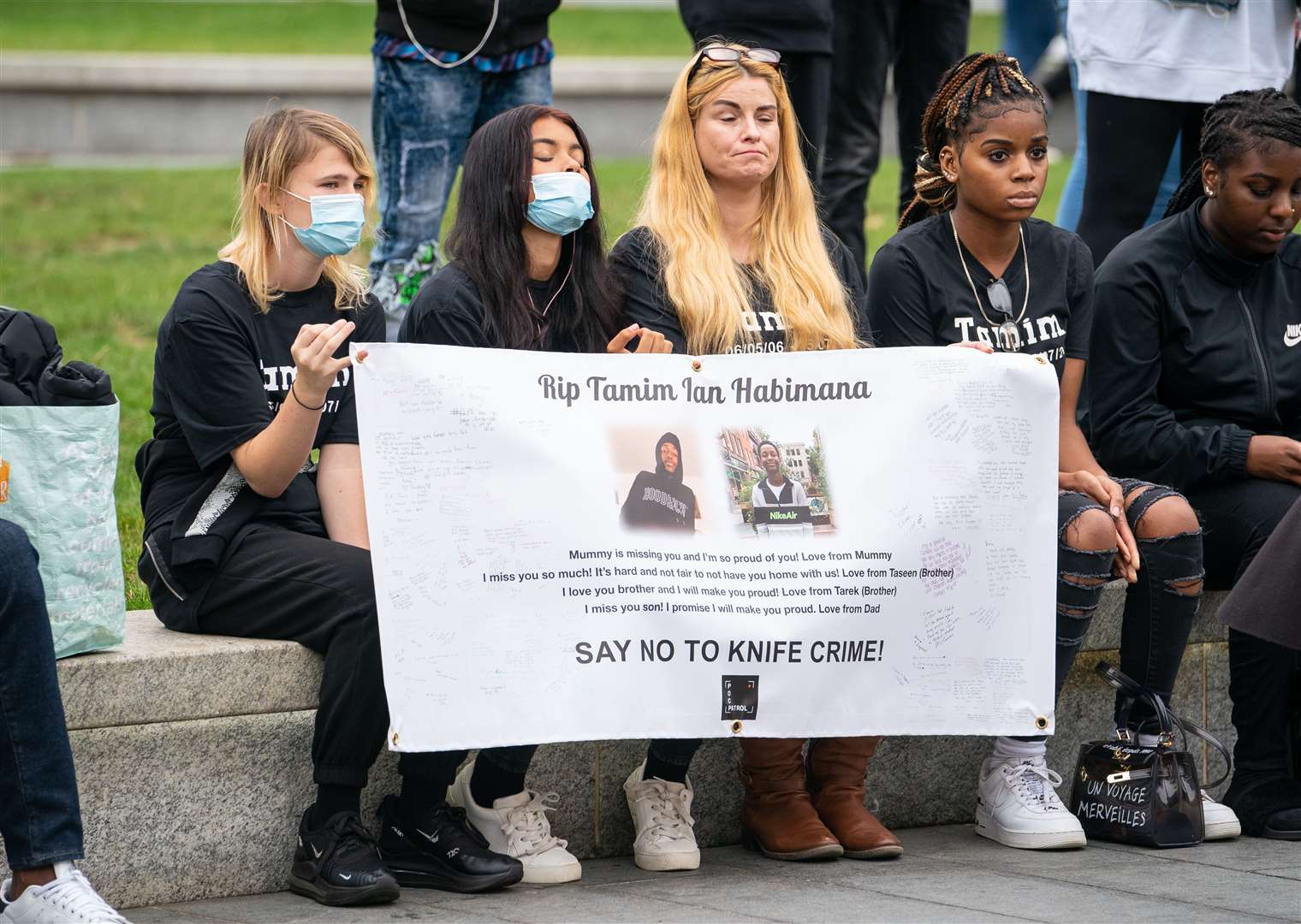 Members of the public at a vigil in General Gordon Square in Woolwich last September to remember Tamim Ian Habimana and to help raise awareness about knife crime (Dominic Lipinski/PA)