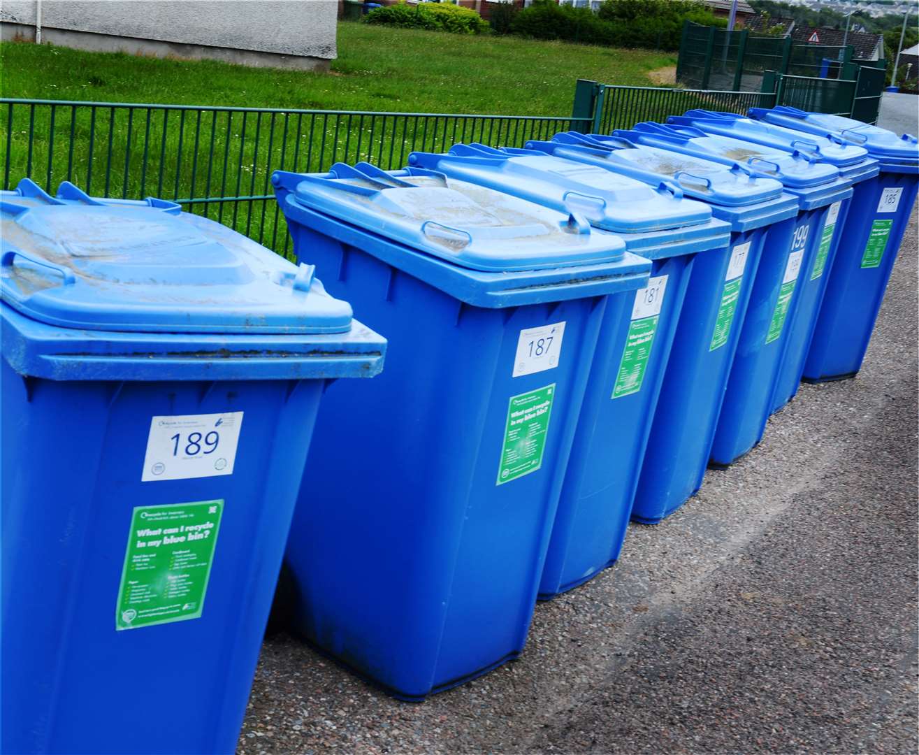 Blue recycling bins.