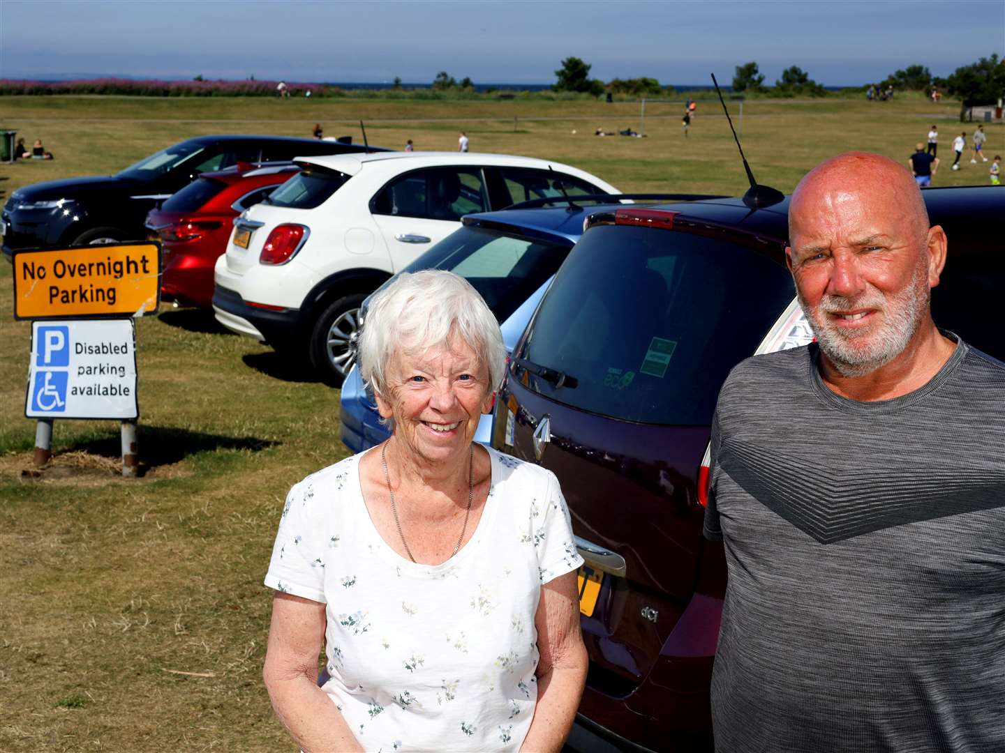 Local residents Evelyn Main and James Walker among those concerned about encroaching car.