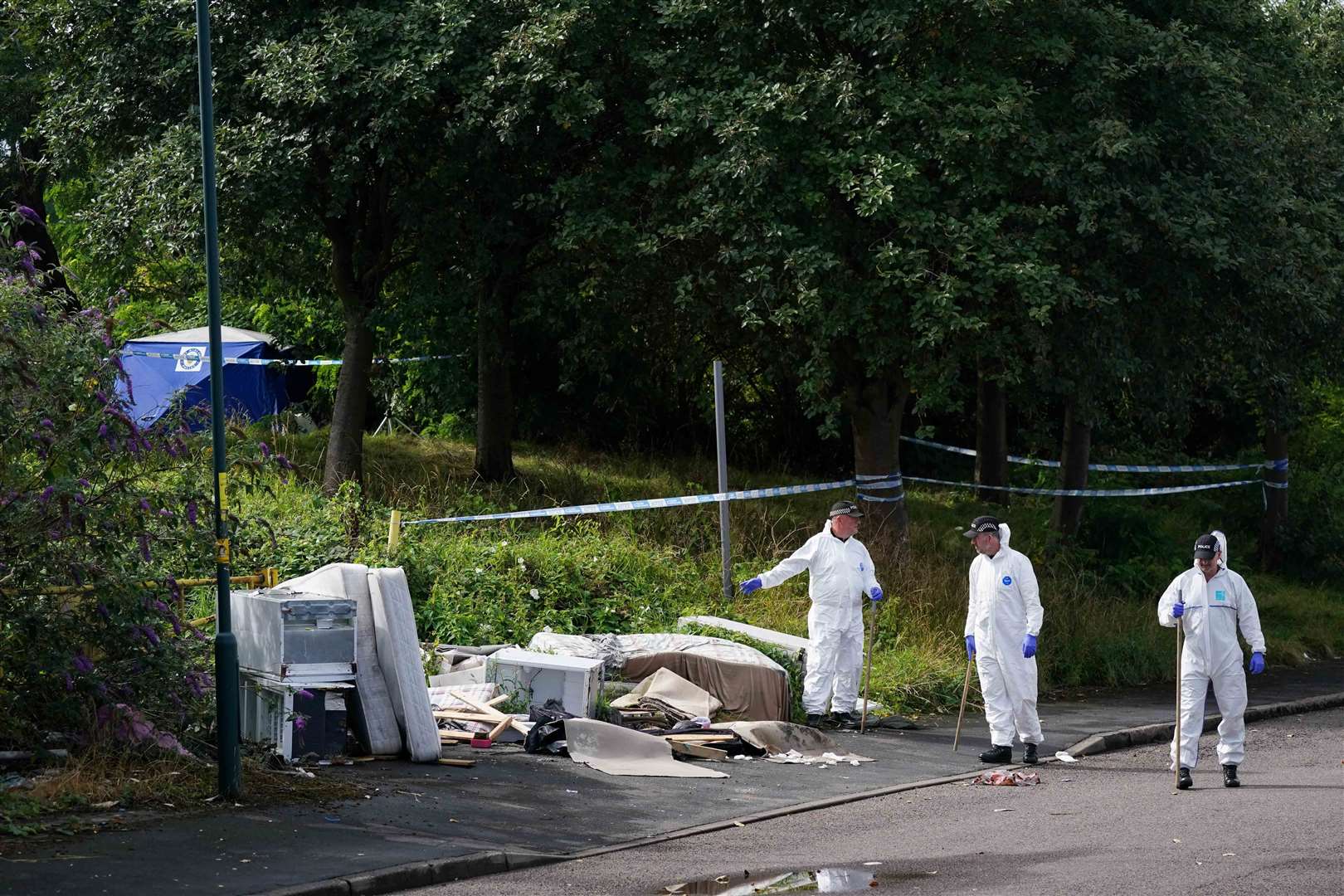 Forensic officers at the scene on August 2 2023 (Jacob King/PA)
