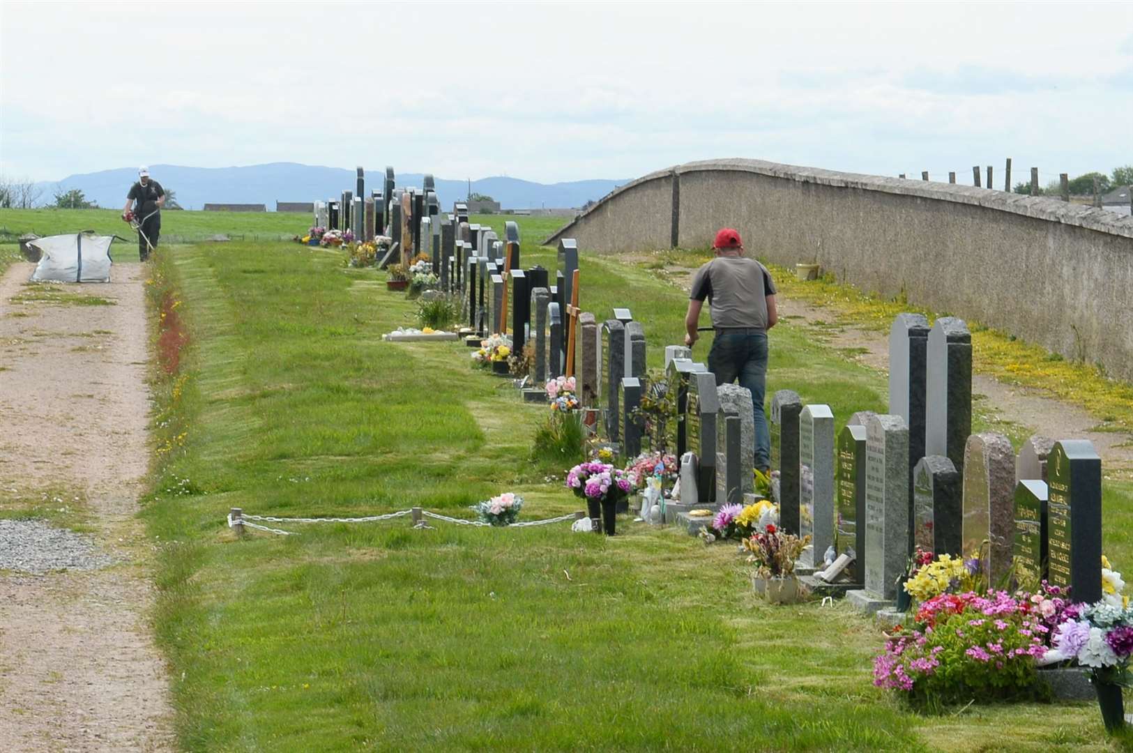 Locals take it upon themselves to tidy Ardersier cemetery. Picture: Gary Anthony