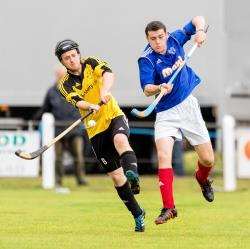 Fort William captain Peter Wood, left, and David Boyle, of Kyles Athletic, compete for the ball in the Sutherland Cup final at Newtonmore.