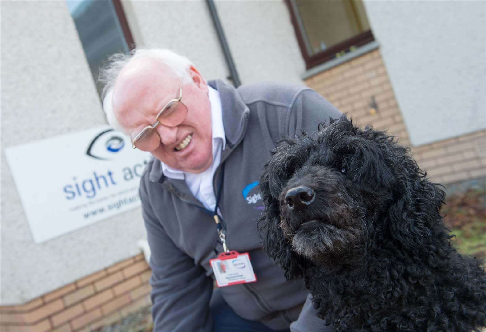 Raymond Smart with his now-retired guide dog Evita.
