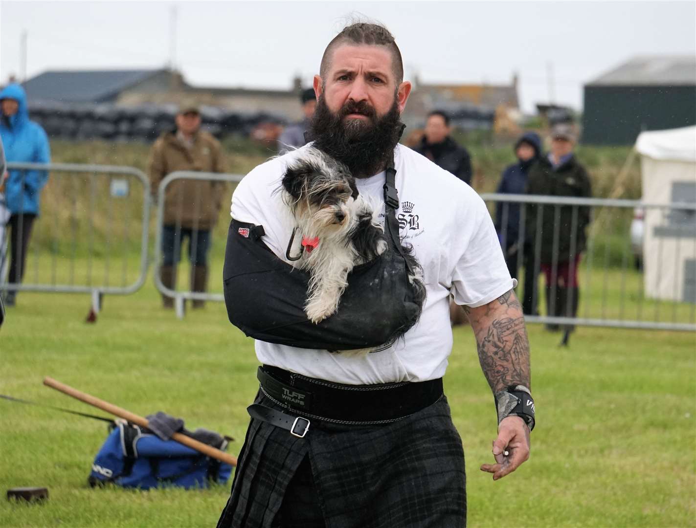 Wounded Highlander athlete Mark Tonner with his dog Rosie . Picture: DGS