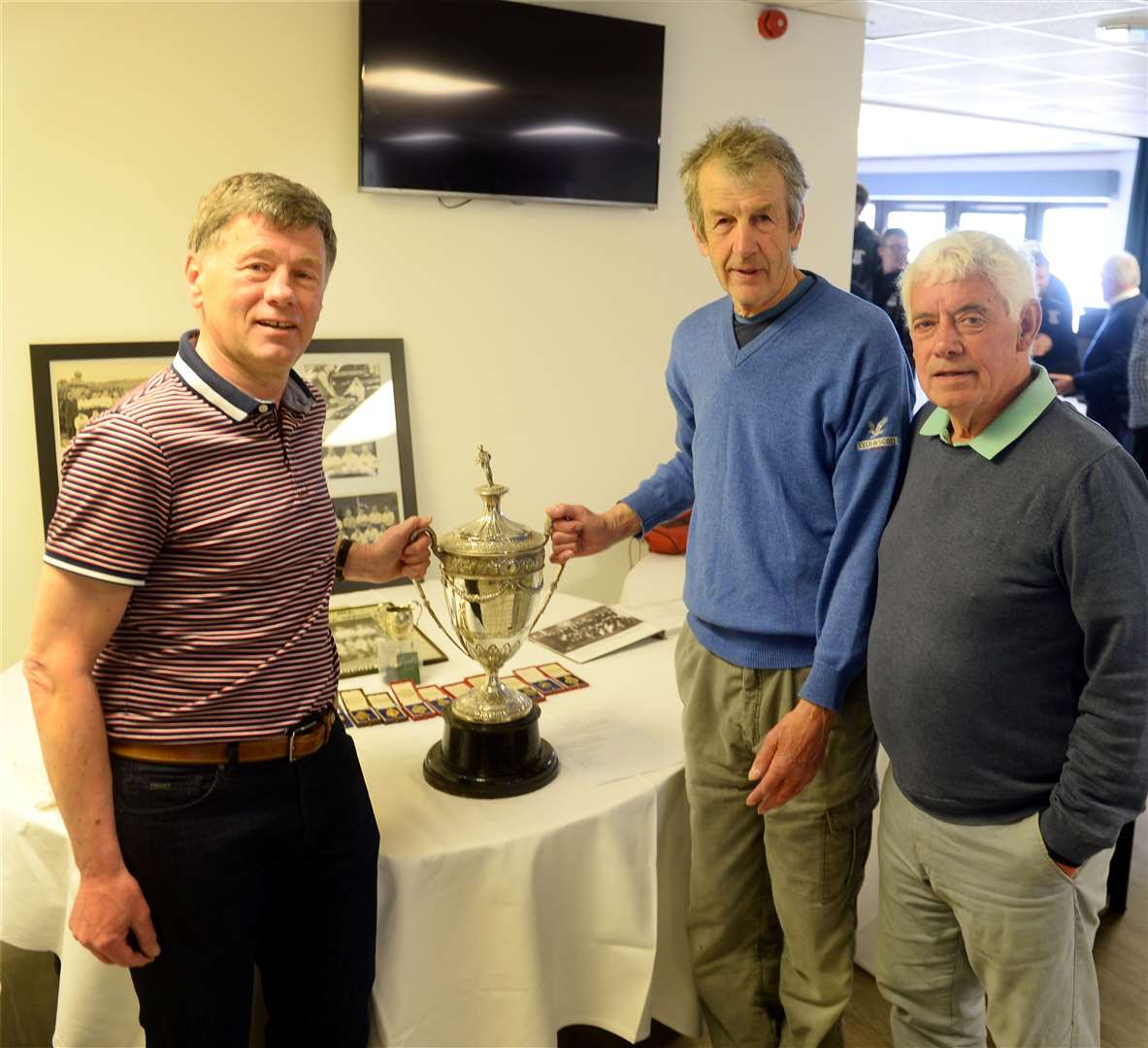 Thistle legend David Milroy with Nairn's Robin Mitchell and Roshie Fraser of Thistle and Clach, all winners of the Inverness Cup.