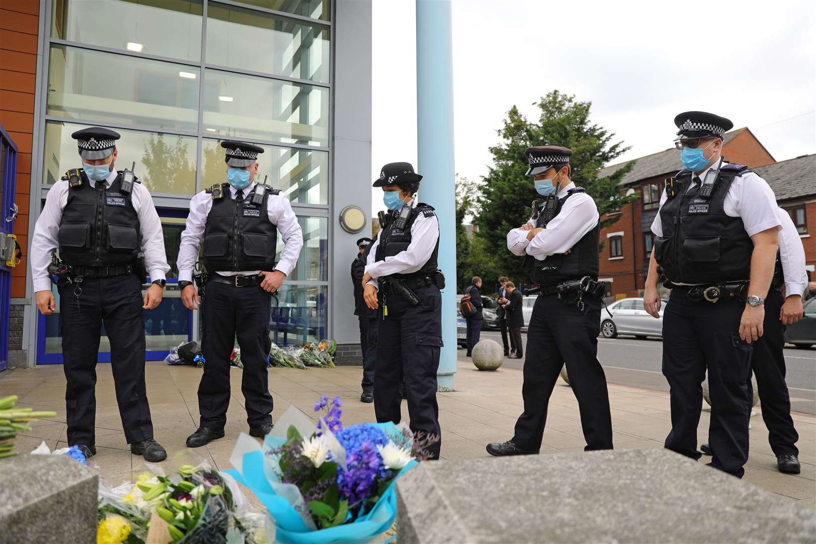 Police officers pay their respects at Croydon Custody Centre (Aaron Chown/PA)