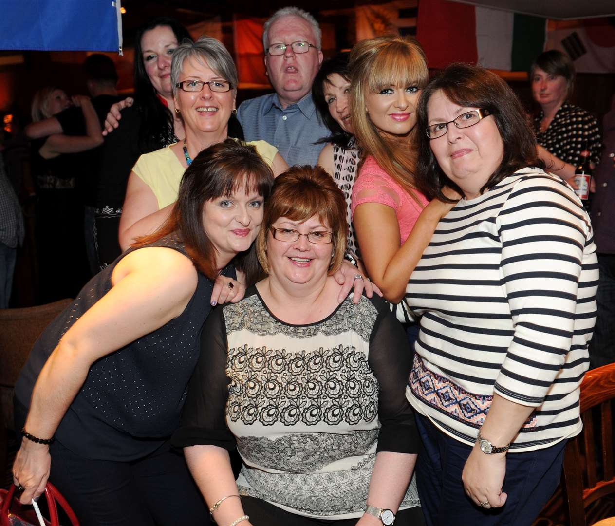 Margaret MacIntyre (centre) celebrates her 50th birthday with friends and family at Auctioneers