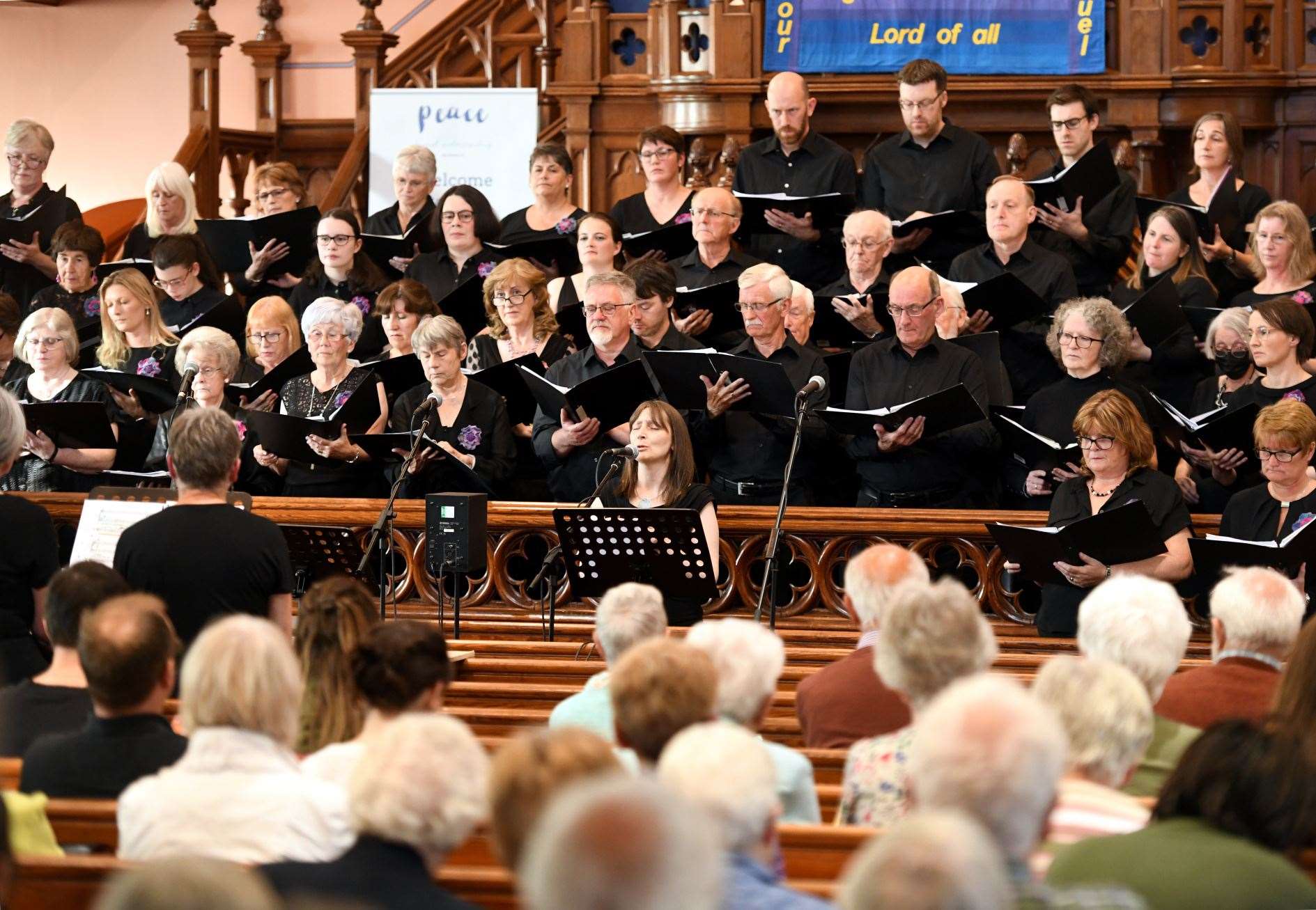 Acclaim Choir stood in front of the congregation. Picture: James Mackenzie