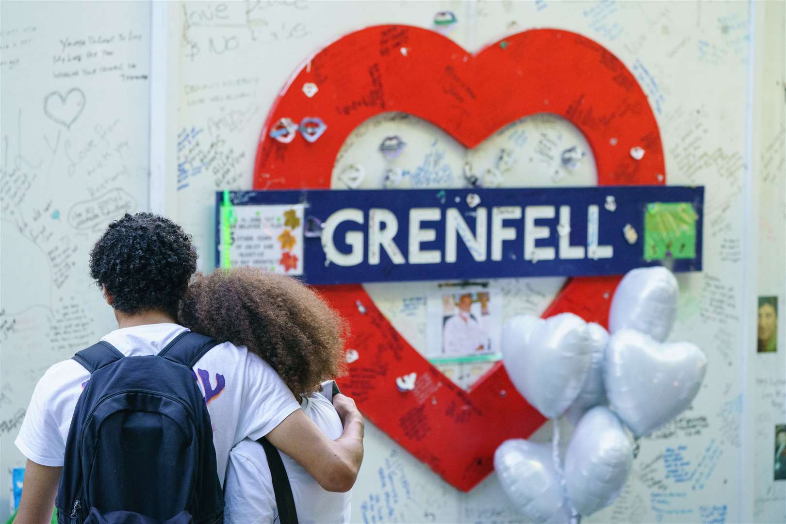 A multi-faith and wreath-laying ceremony at the base of Grenfell Tower (Dominic Lipinski/PA)