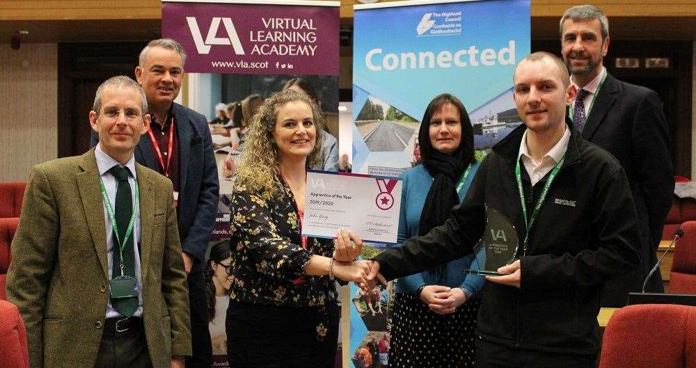 John Greig (front right) with VLA manager Louise Wheeler and, from left, Highland Council ICT manager Jon Shepherd, VLA consultant Roy MacKenzie, council learning adviser Fiona Emslie and digital services manager Robert Newman.