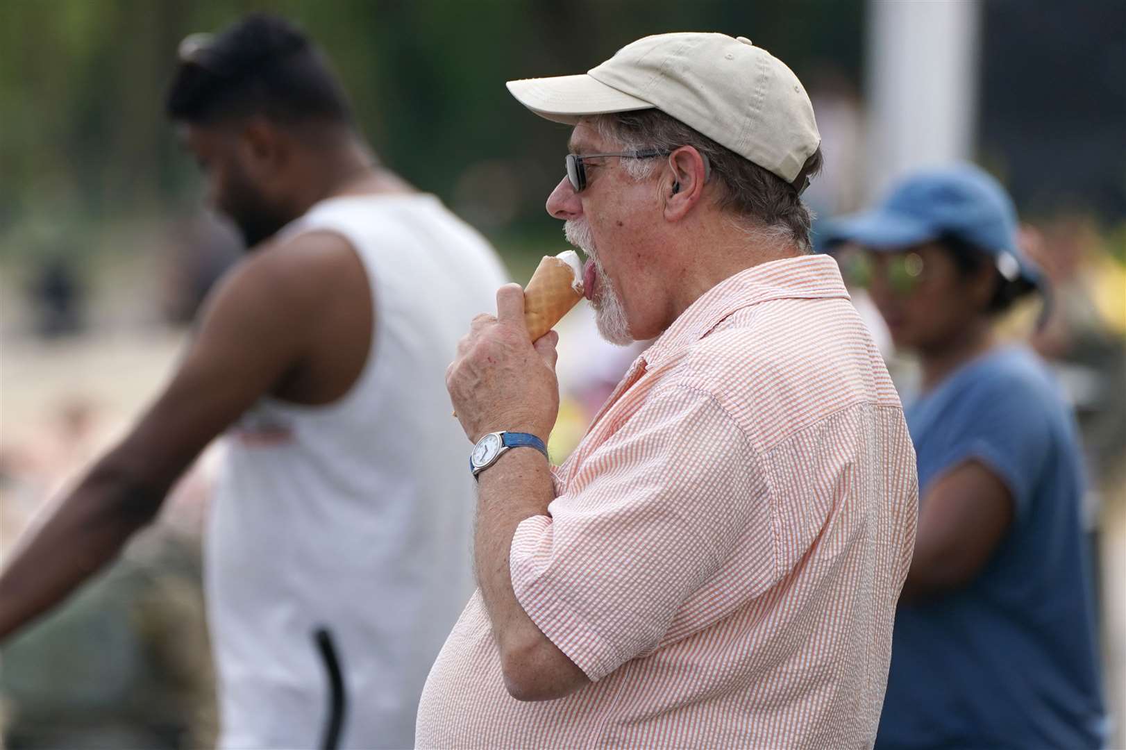 A man eating ice cream in the village of Luss, on the banks of Loch Lomond (Andrew Milligan/PA)