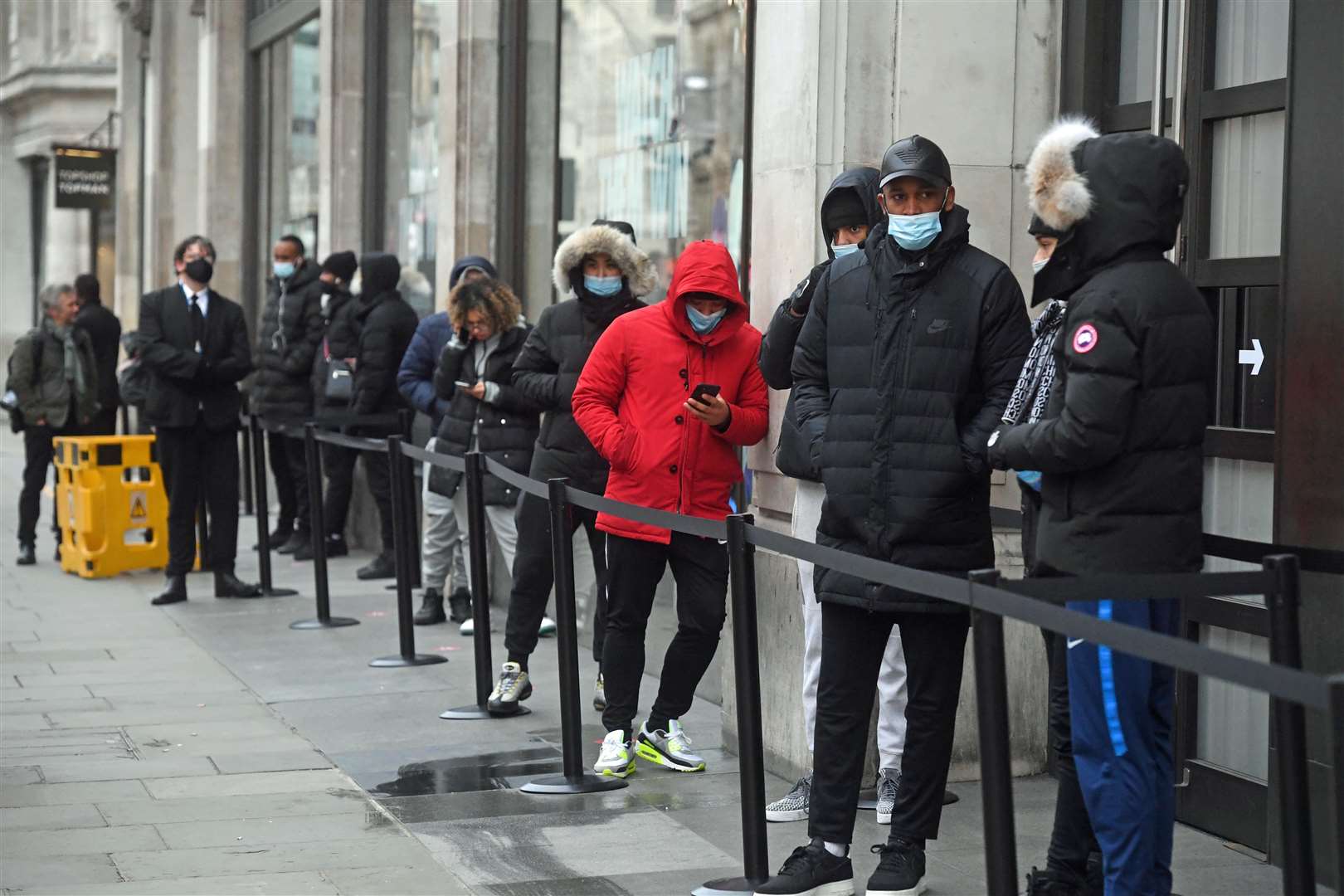 Shoppers outside the Nike Town store at Oxford Circus, London (Kirsty O’Connor/PA)