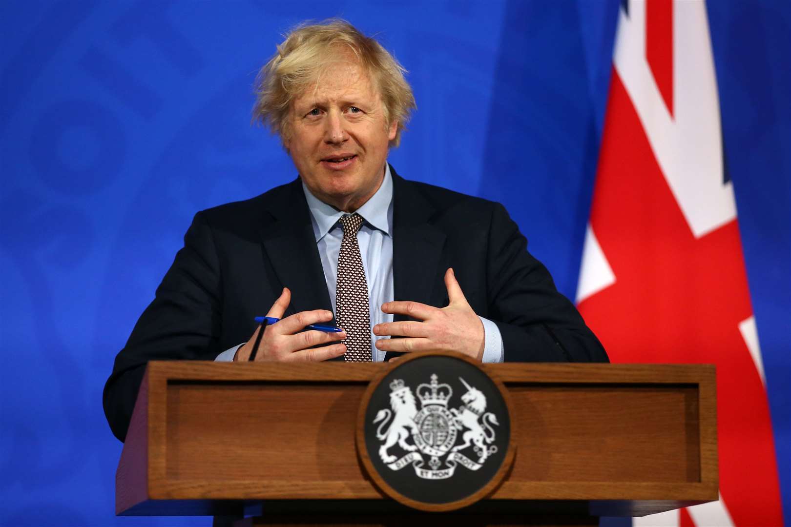 Prime Minister Boris Johnson says there is “definitely going to be a world in which international travel will use vaccine passports” (Hollie Adams/PA)