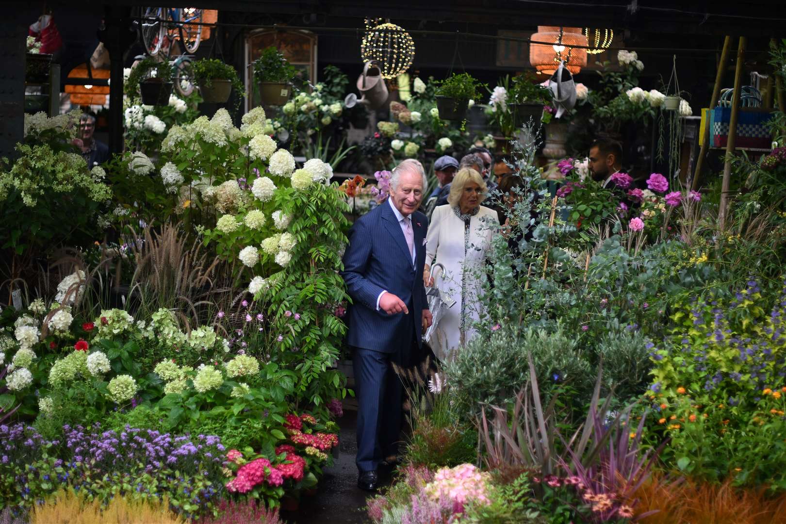 Charles and Camilla also paid a visit to the central Paris Flower Market (Daniel Leal/PA)