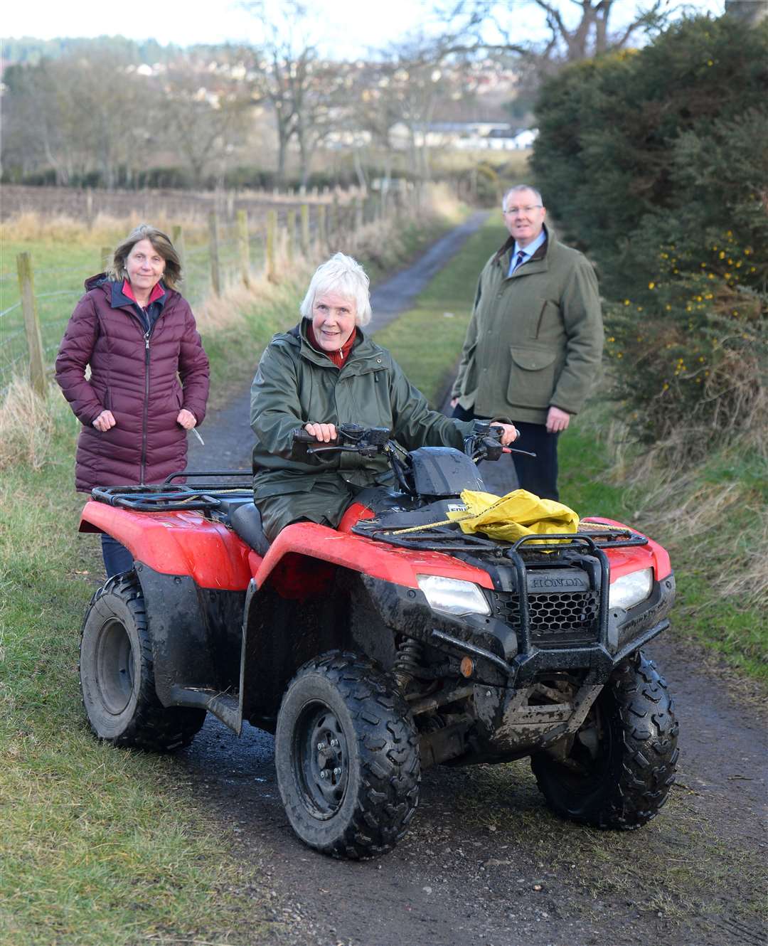 Ashton Farm road access..Carol Munro(centre) with councillors Isabelle MacKenzie and Duncan Macpherson on the road...Picture: Gary Anthony..