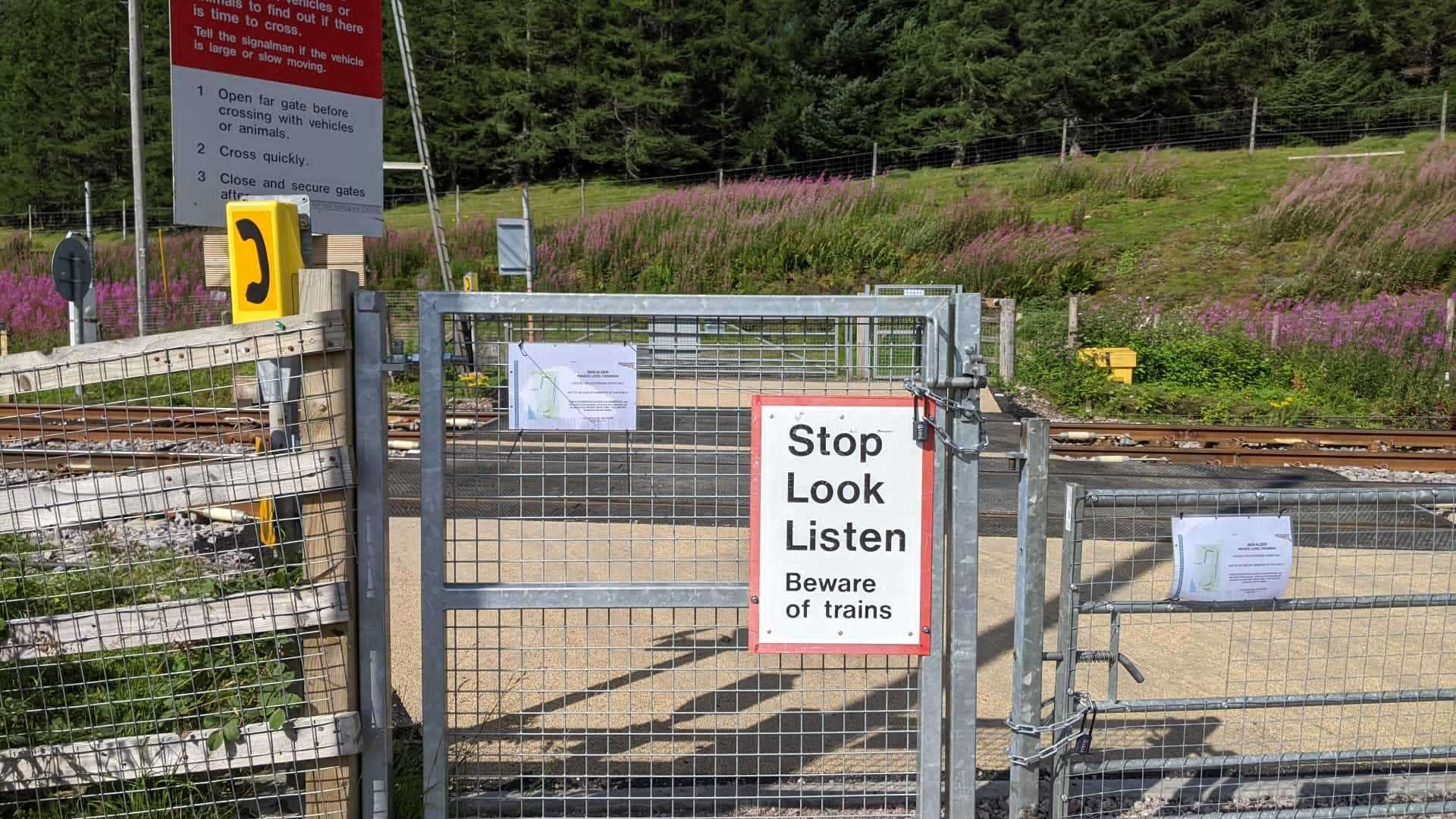 Network Rail has locked the barriers at Dalwhinnie level crossing.