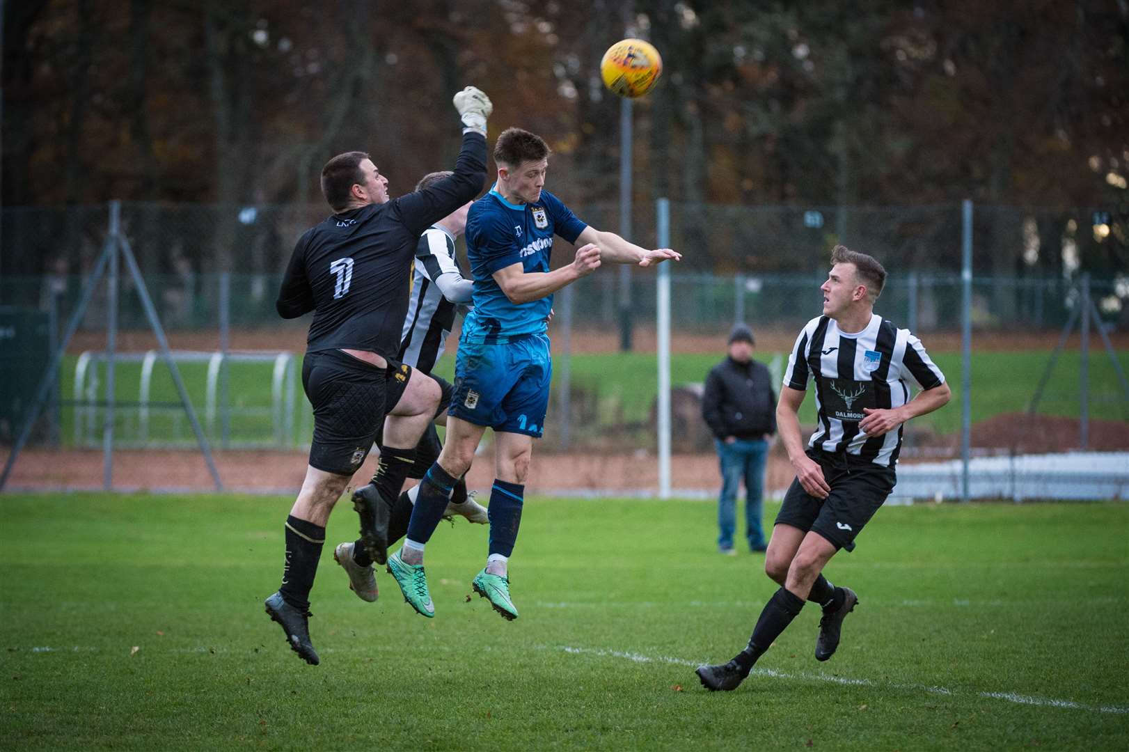 North Caledonian League Div 2..Alness v Lochness..Lochness keeper Michael Miele is first to the ball...Picture: Callum Mackay..