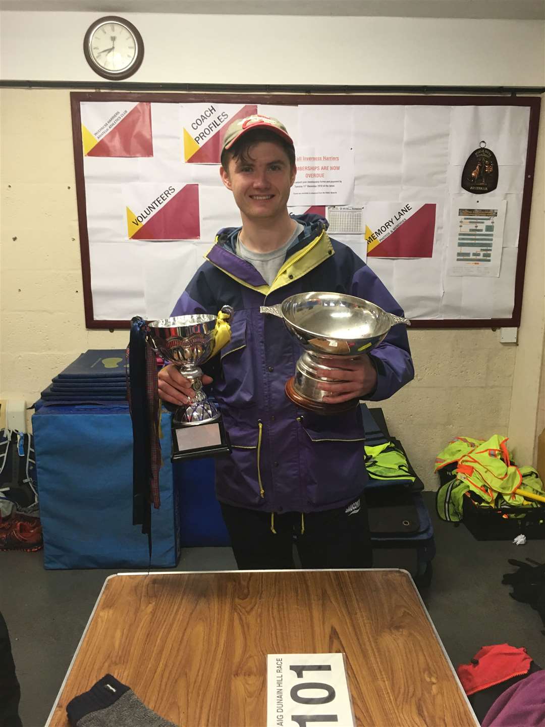Craig Dunain Hill Race winner Craig Campbell with the individual and team trophies.