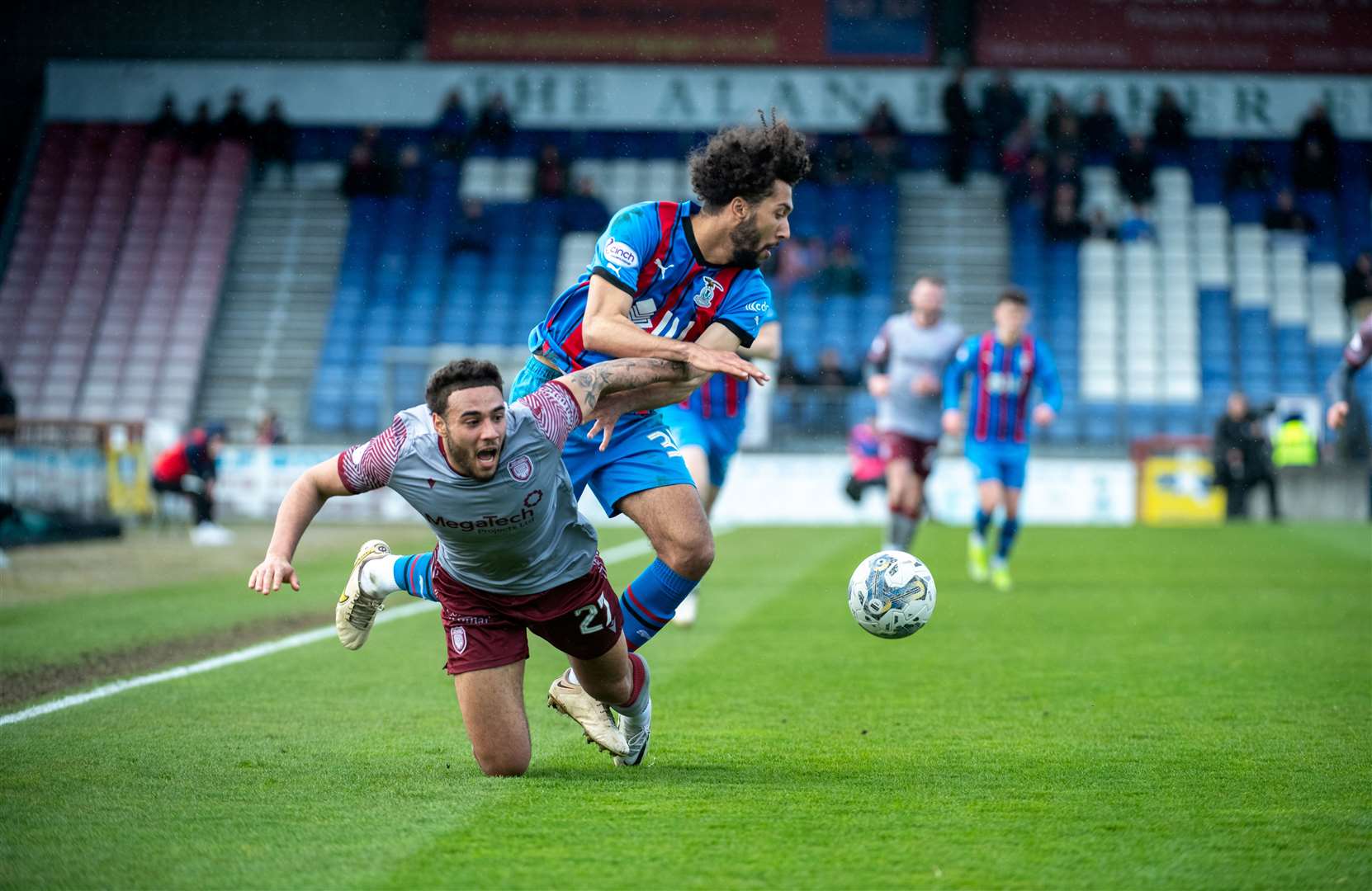 Caley defender Remi Savage and Arbroth striker Jay Bird battle for possession. Picture: Callum Mackay.