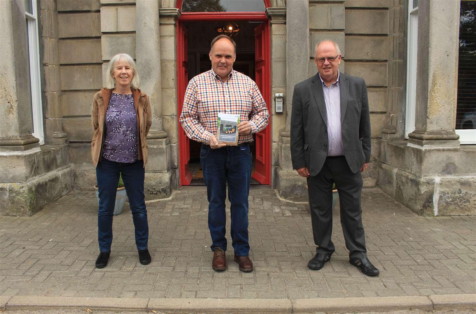 Donald MacDonald (centre) with Chris Nicolson and Ian Leith outside the Manor House hotel in Thurso where Life’s Too Short for Ironing Shirts was launched. Picture: Alan Hendry