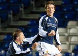 Stuart Love celebrates scoring against England for Scotland's under-18 schoolboys in Inverness on Thursday.