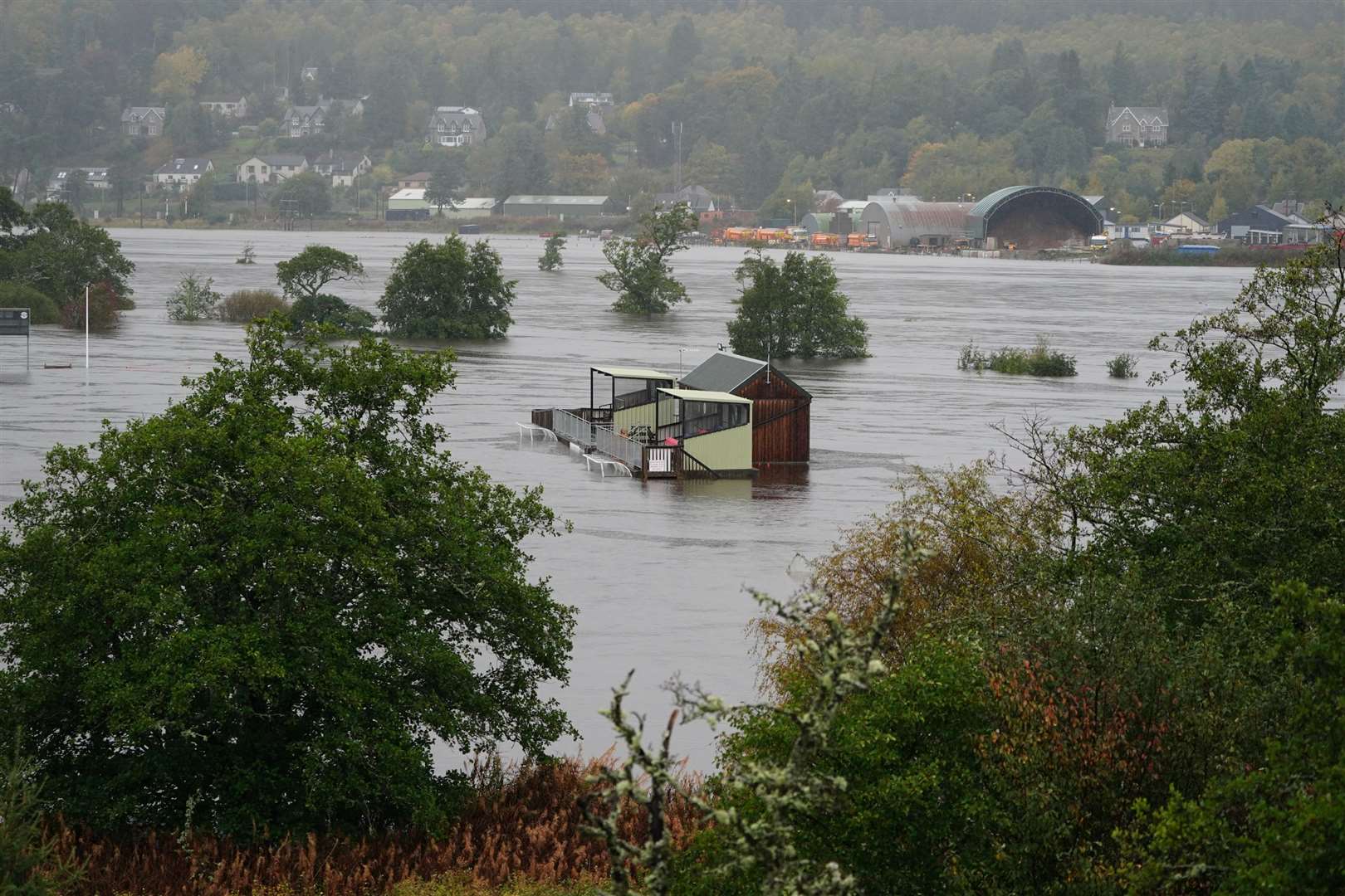 The flooded Dell sports field in Kingussie near Aviemore (Jane Barlow/PA)