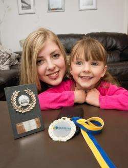 Emma with Lana and her award from the CITB.