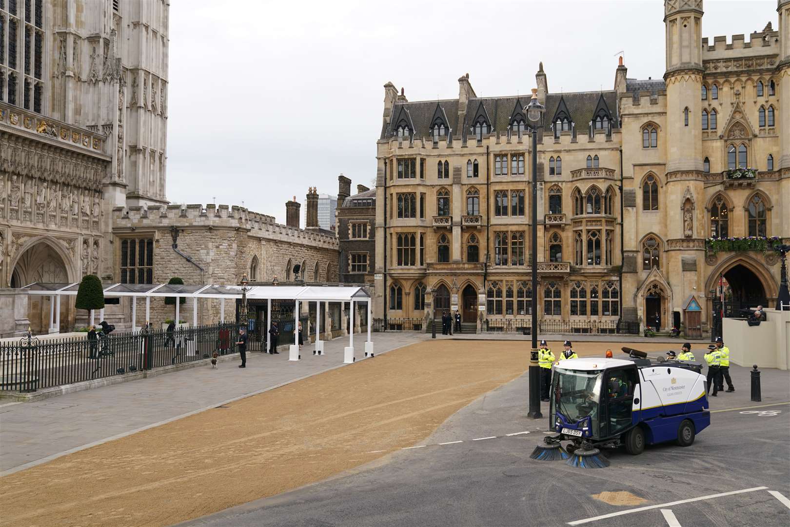 A road sweeper at work in front of the abbey (Joe Giddens/PA)