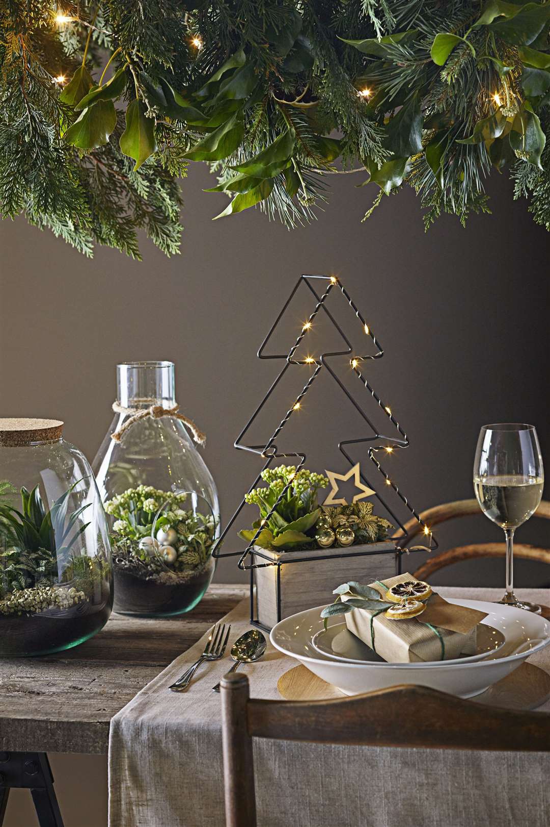Terrarium and houseplants with a Christmas tree frame. Picture: Dobbies Garden Centres/PA