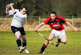 Lovat's Fraser Gallacher (left) is challenged by Ali Mackintosh of Glenurquhart for the ball.