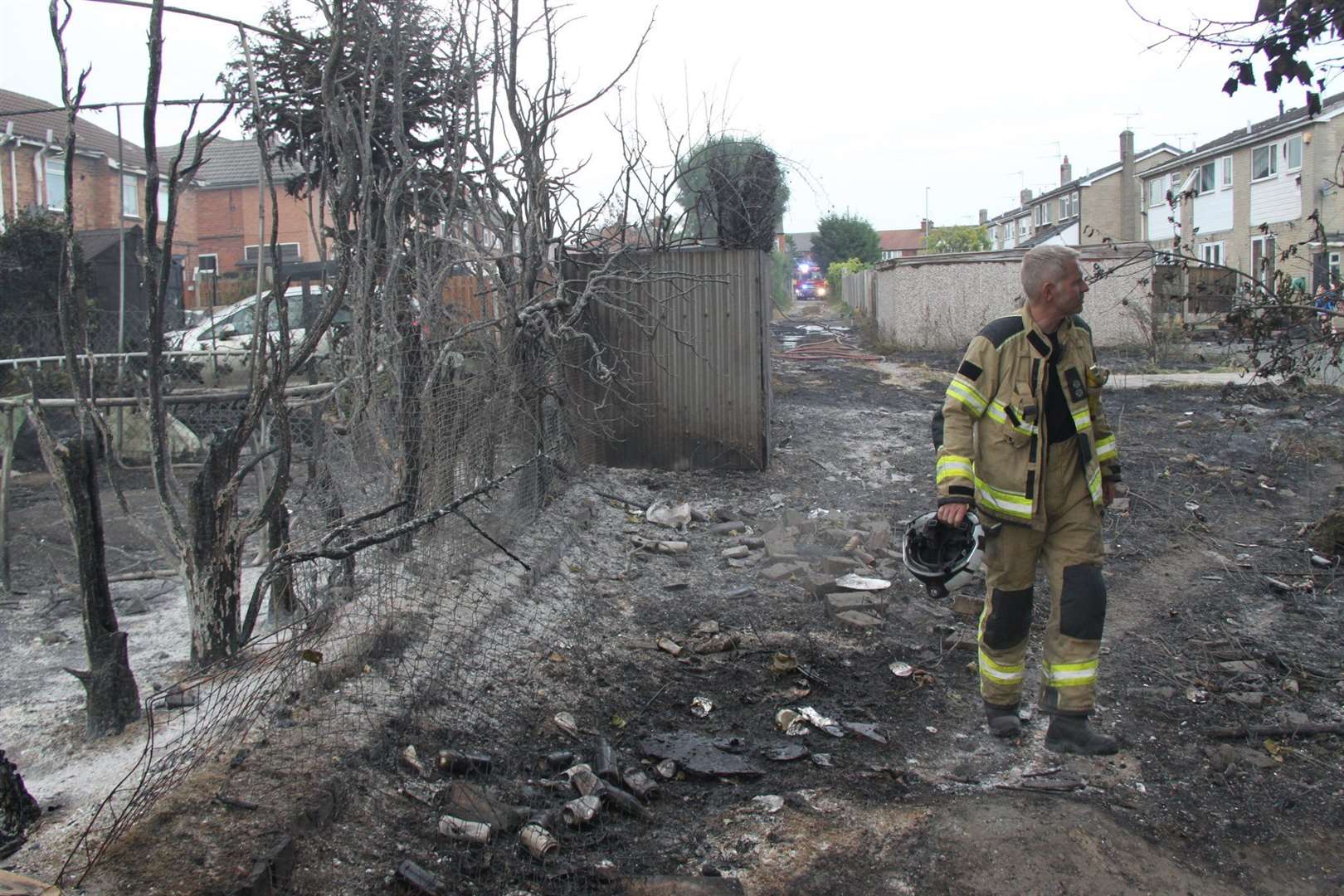 Firefighters in Maltby after a fire started on scrubland before spreading to outbuildings, fences and homes (South Yorkshire Fire and Rescue)