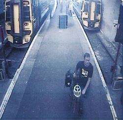 CCTV footage of Gary Strachan arriving at Inverness Railway Station.